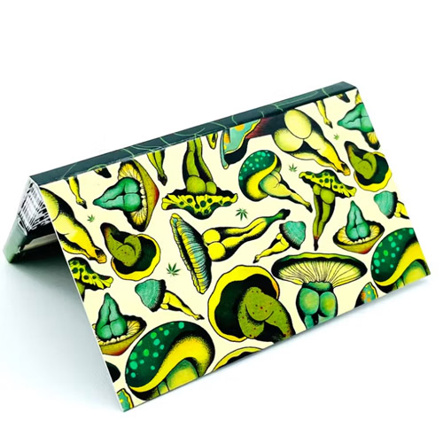 Mush Love rolling papers featuring a psychedelic mushroom-themed design, a cannabis accessory available at Midnight Greens Dispensary.