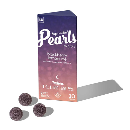 Grön Blackberry Lemonade Sugar-Coated Pearls indica gummies with CBN, shown with purple packaging and three round edibles, available at Midnight Greens Dispensary.