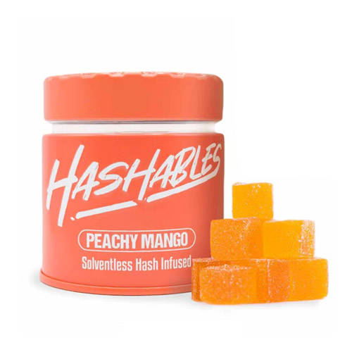 Hashables Peachy Mango solventless hash infused gummies in orange jar, available at Midnight Greens Dispensary.