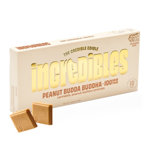 Incredibles Peanut Budda Buddha cannabis edible bar with 100mg THC, featuring peanut buttery pretzels, sold at Midnight Greens Dispensary.