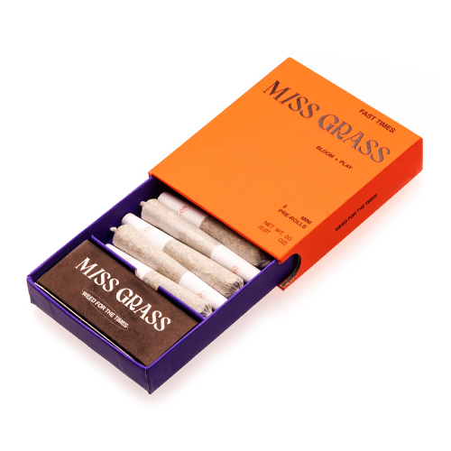 Miss Grass Fast Times pre-roll pack with five mini joints in bold orange and purple box, labeled Bloom + Play, available at Midnight Greens Dispensary.